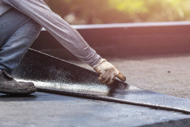 Professional Exterior Waterproofing technician working in Versailles, OH